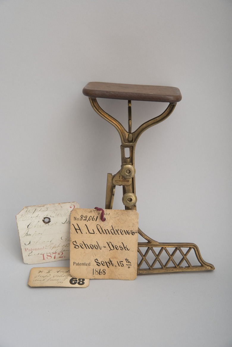 wood desk on brass base