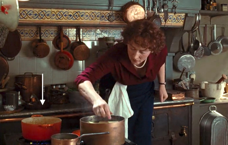 Meryl Streep as Julia Child cooking in Julie & Julia with a Le Creuset on the stove