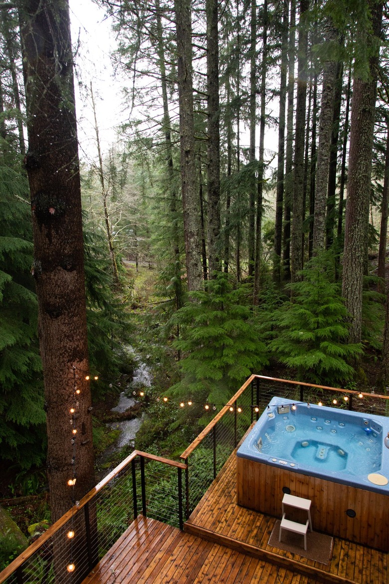 A jacuzzi on a wood deck