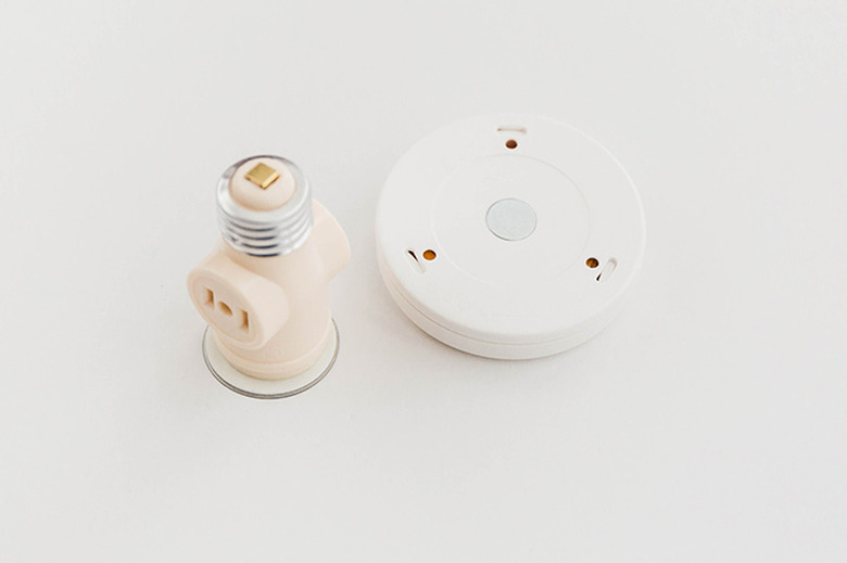 Pop the magnet off the back of the puck light.