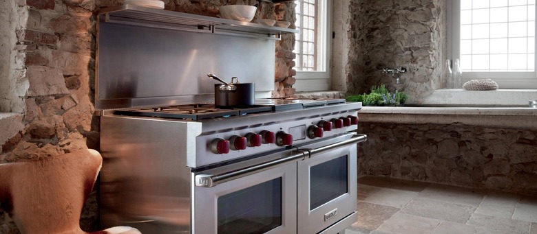 brick kitchen with wolf stove