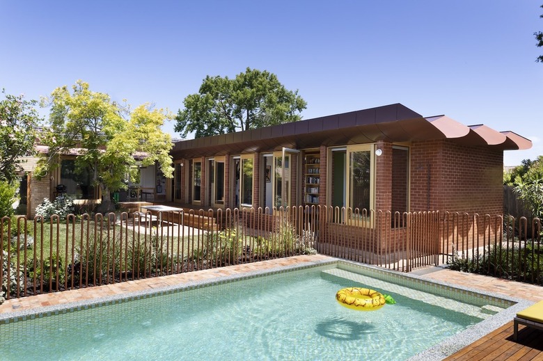 Exterior of new addition alongside the pool