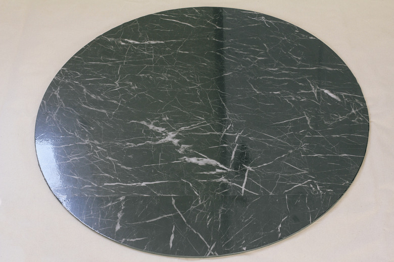 Second piece of contact paper adhered to table