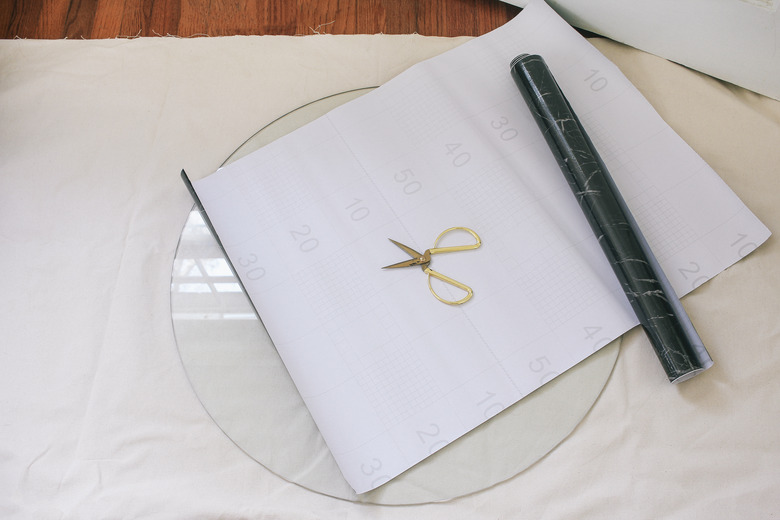 Piece of black marble contact paper cut to size