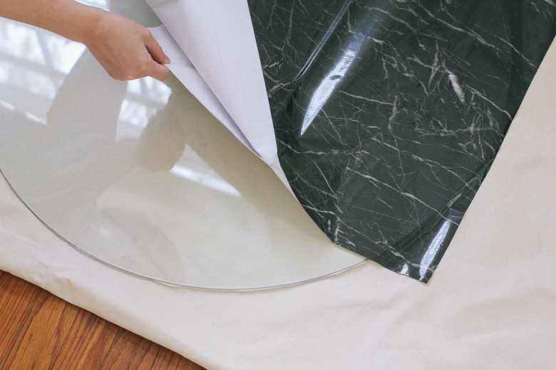 Peeling backing off contact paper