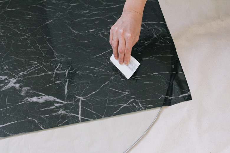 Smoothing contact paper with credit card