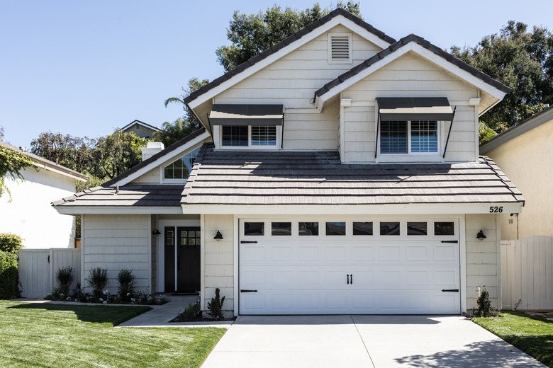 Garage on white traditional house