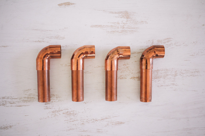 Elbow fittings attached to small pipes