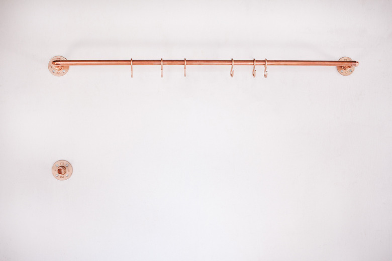 Flange for second pipe mounted on wall