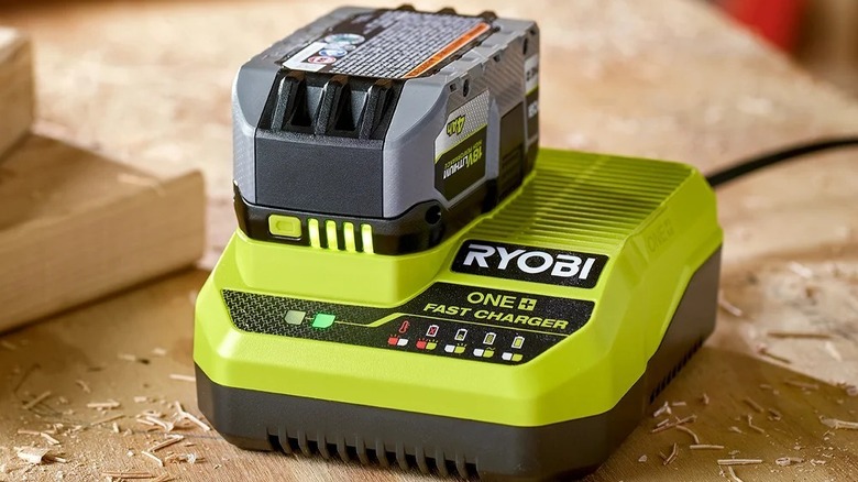 Ryobi 18V ONE+ battery charging in a charger