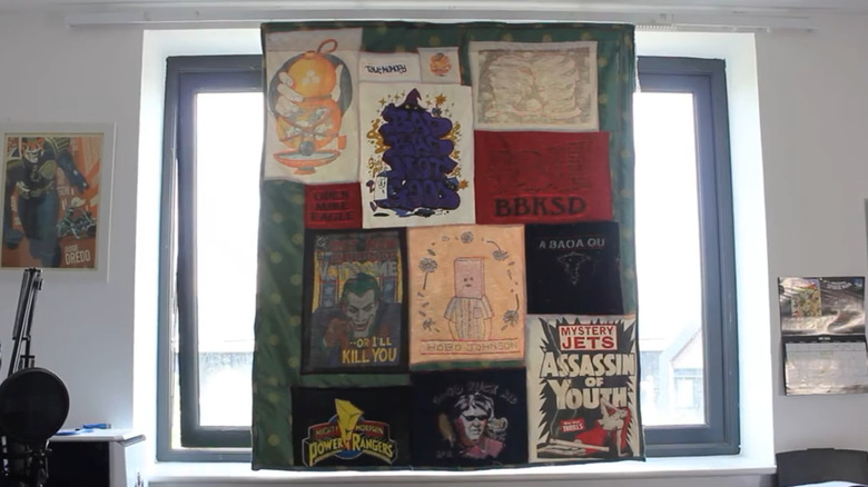 A patchwork curtain made from vintage graphic tees