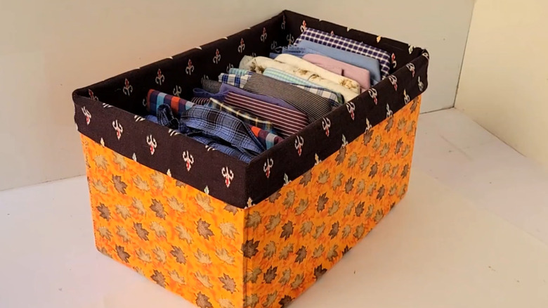 A storage basket made from a leaf patterned nightgown