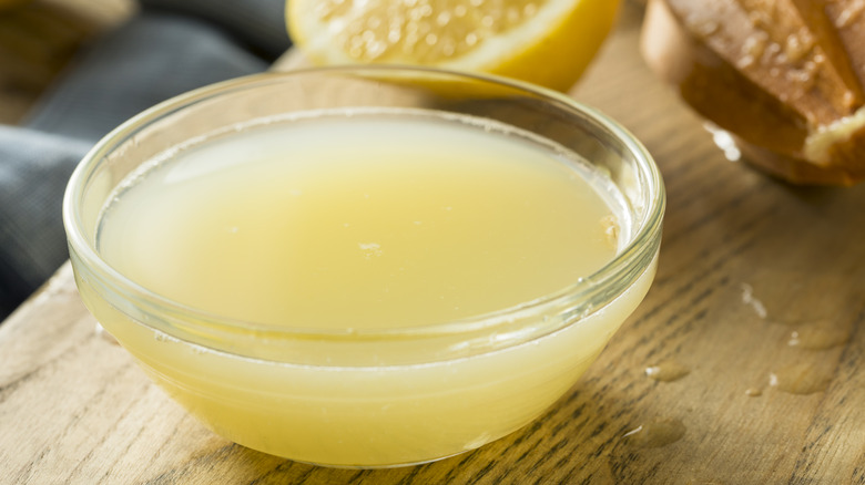 Freshly squeezed lemon juice in a glass bowl
