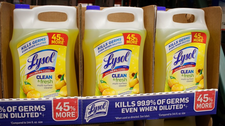 Several bottles of Lysol on a store shelf
