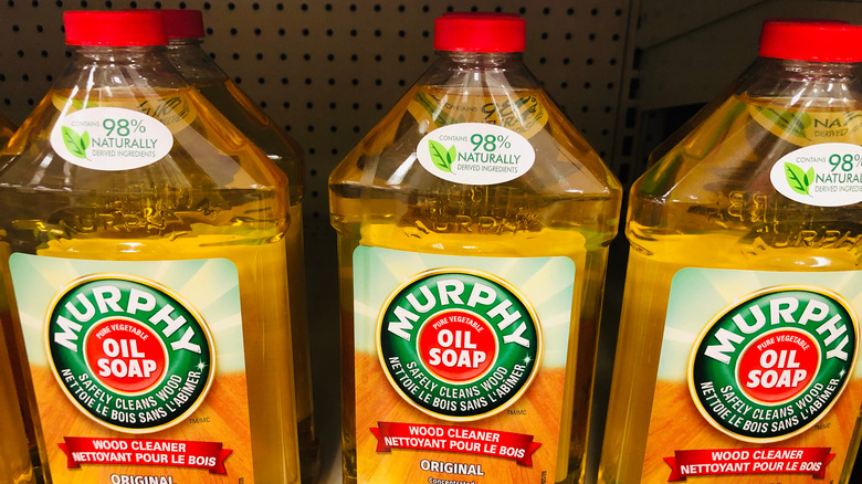Shelf filled with Murphy Oil Soap bottles
