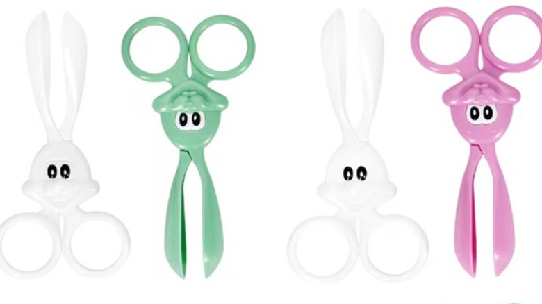 Four sets of plastic bunny tongs displayed in various pastel colors.