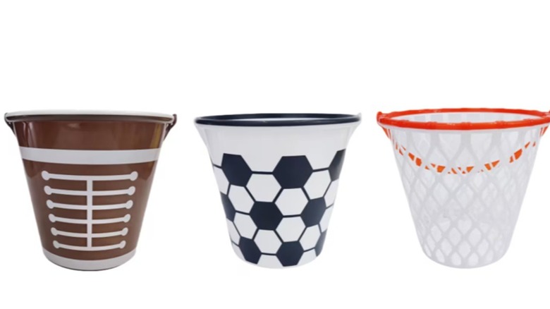 Three easter baskets themed for football, soccer, and basketball.