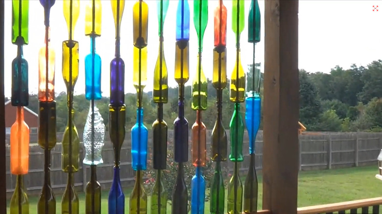 Privacy wall made of multi-colored bottles