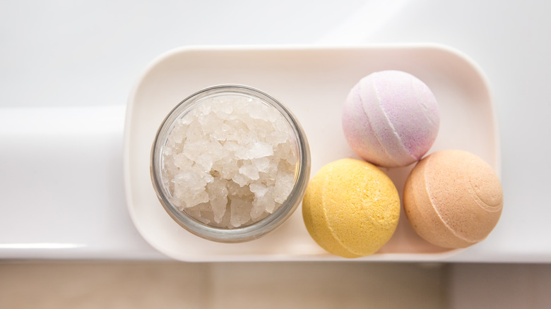 a homemade bath bombs next to bath salts