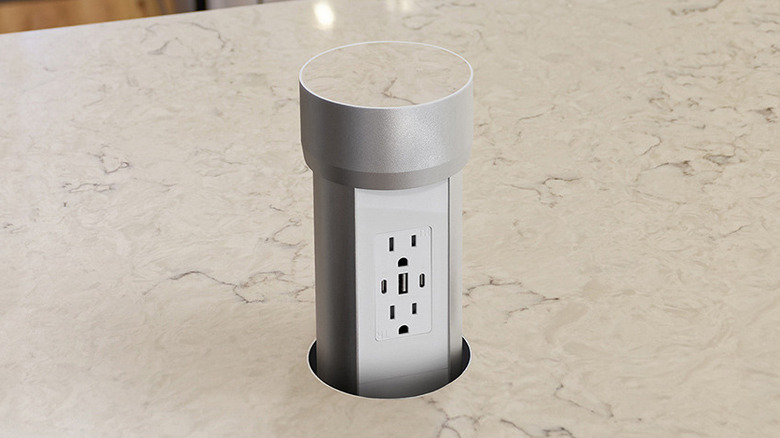 a pop-up outlet matched to a kitchen countertop