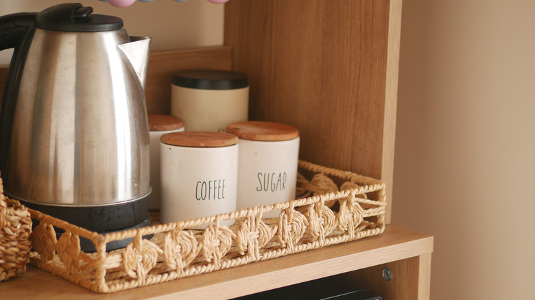 coffee station supplies in a basket tray