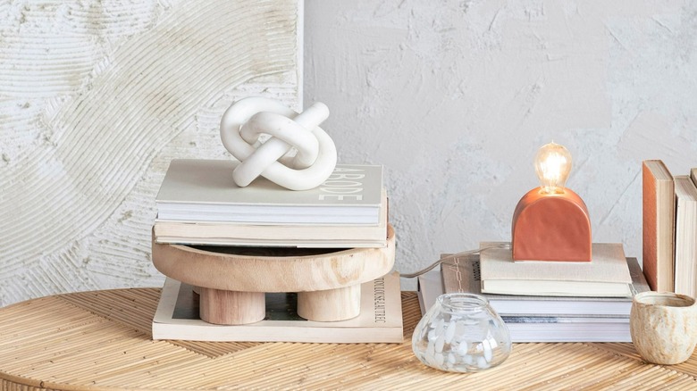 Expensive white marble chain link decor in neutral chic room