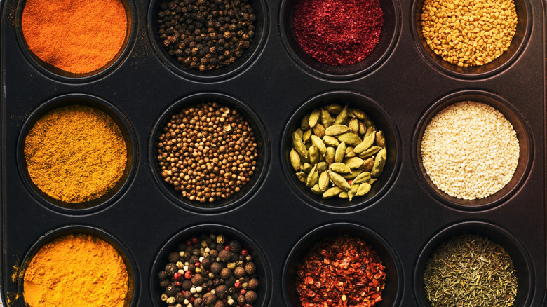 Seasonings and spices in muffin tin slots