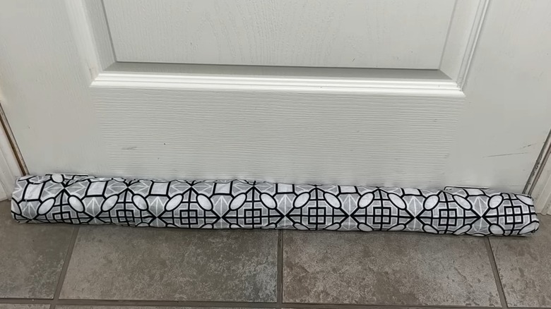 DIY draft blocker on kitchen door.