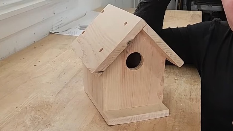 A basic birdhouse made from scrap wood