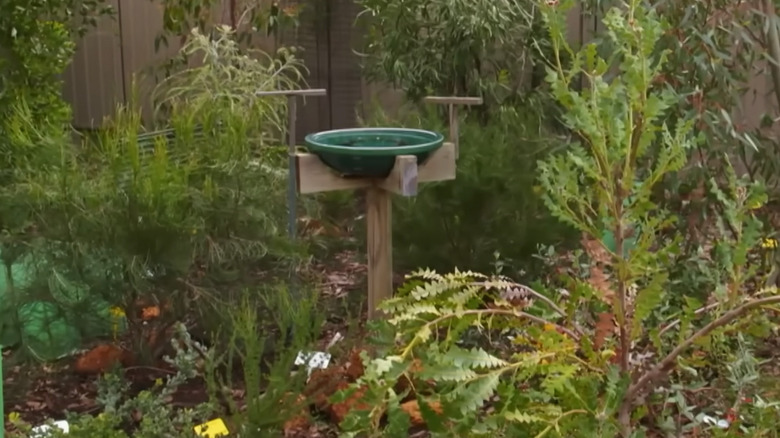 DIY birdbath stand made from scrap wood