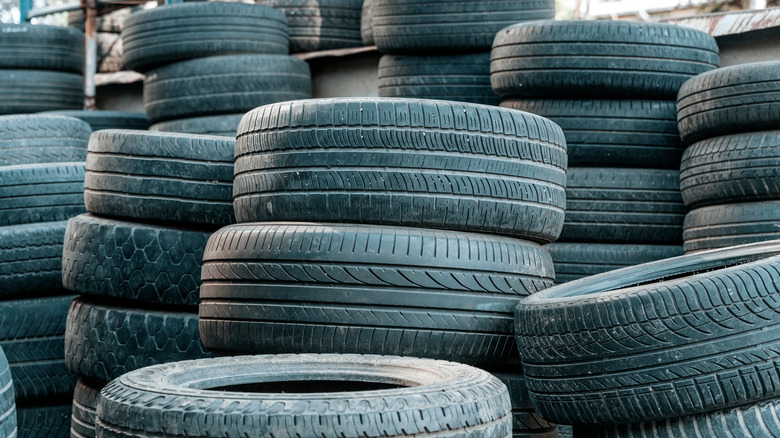 Worn out, piled up car tires