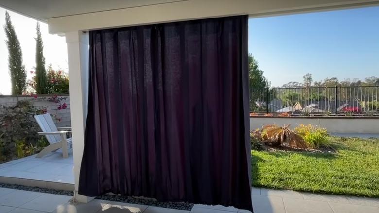 outdoor curtains used as a privacy screen