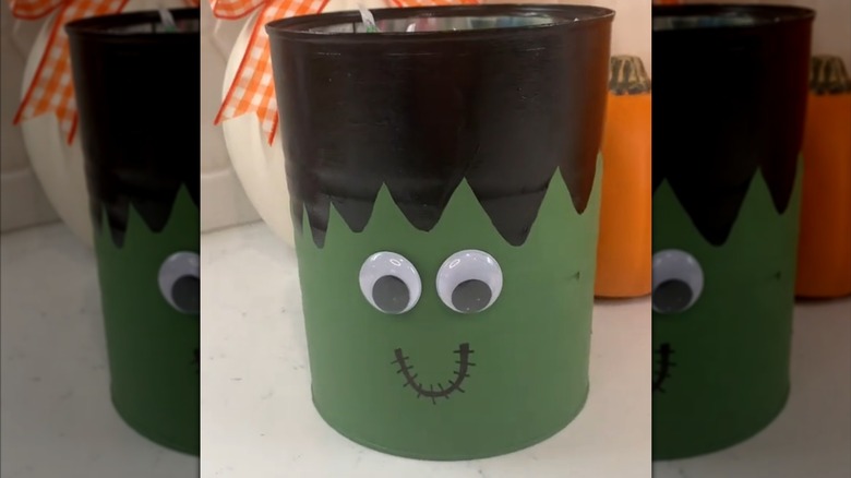 Frankenstein Halloween-style candy tin with googly eyes made from upcycled coffee container