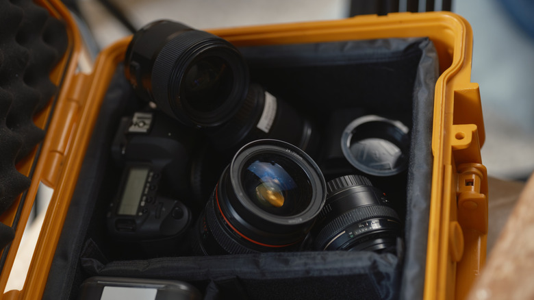 A box of camera lenses