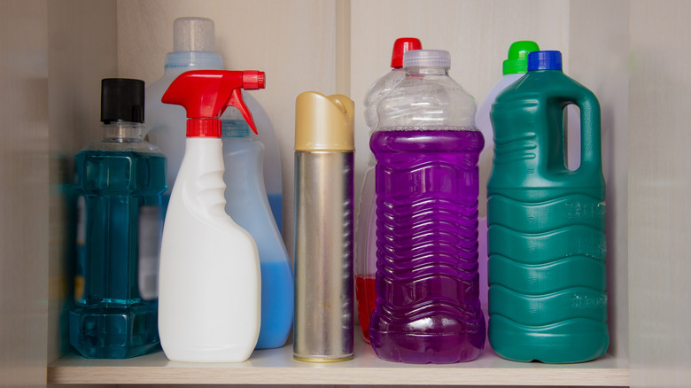 Unlabeled bottles of cleaning chemicals