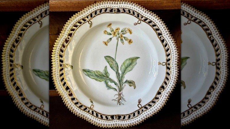 A Royal Copenhagen Flora Danica dinner plate with cut-out edges