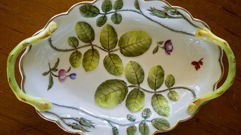 A close up of a Royal Worcester serving platter with the Blind Earl pattern