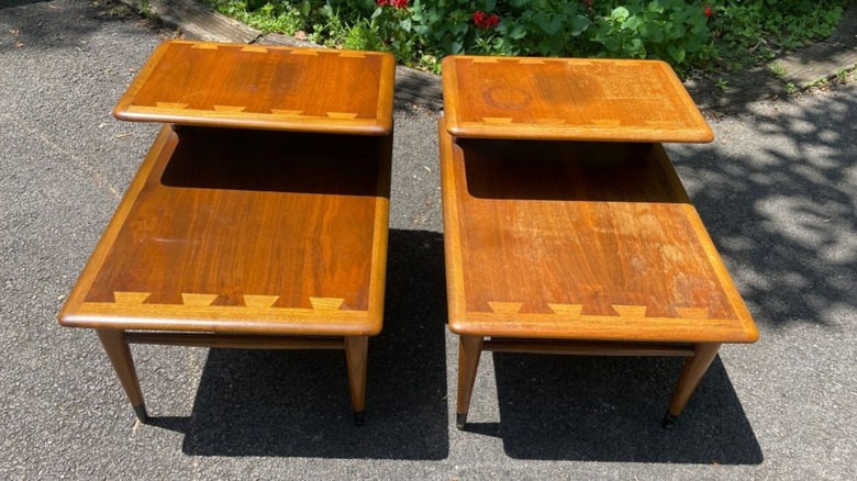 Two Acclaim side tables sitting side by side outside