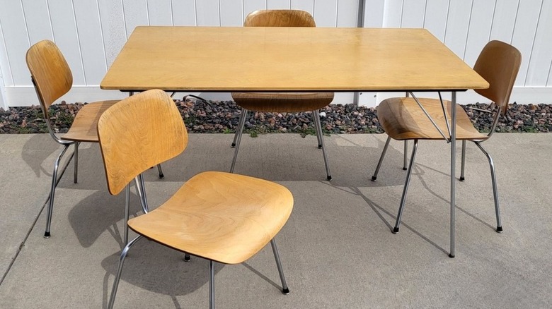 Eames dining room table with four chairs