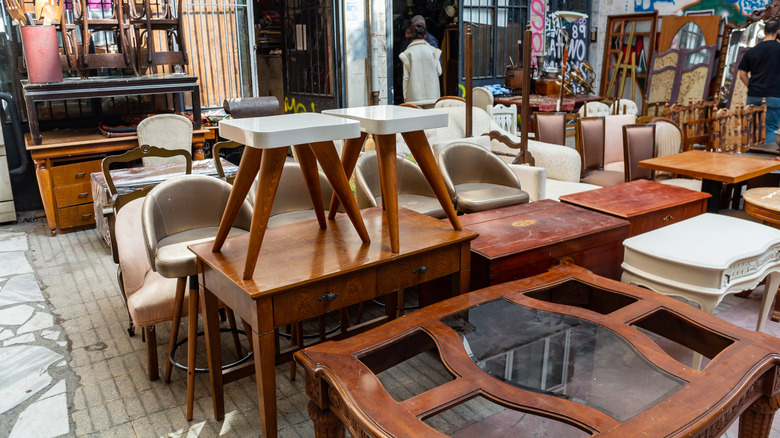 Antique tables at a thrift store