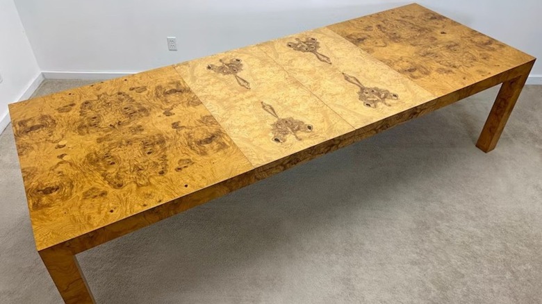 Milo Baughman Thayer Coggin dining room table sitting in a room