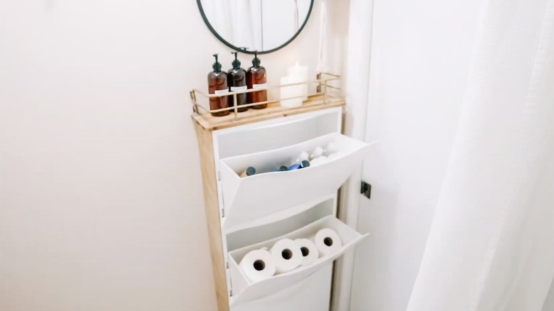 IKEA Trones cabinet used in bathroom for toiletry and toilet paper storage