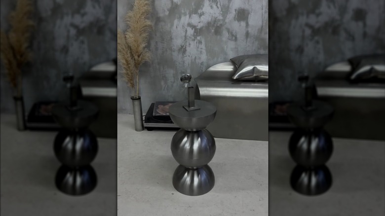 Side table with integrated steel candle lantern