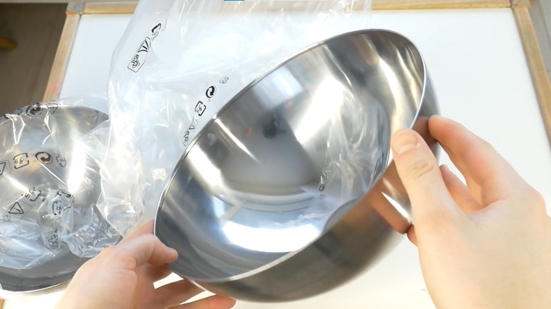 Person holding an IKEA BLANDA BLANK serving bowl