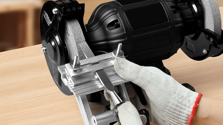 Vevor's adjustable replacement tool rest and sharpening jig on a bench grinder