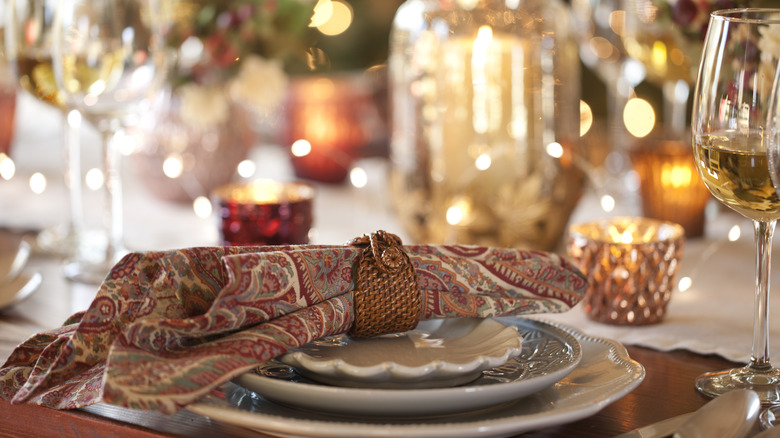 A table setting with a cloth napkin