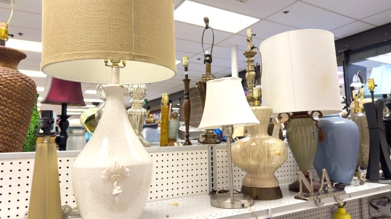 Lamps on a thrift store shelf