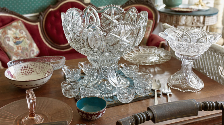 A crystal punch bowl on a dining table