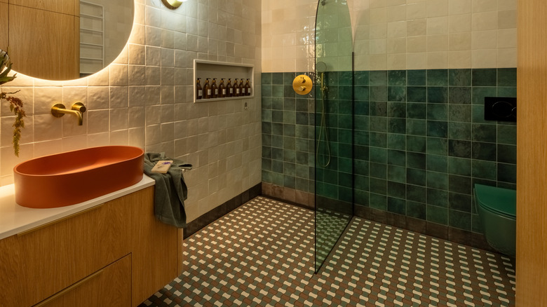 Modern bathroom with geometric floor tiles