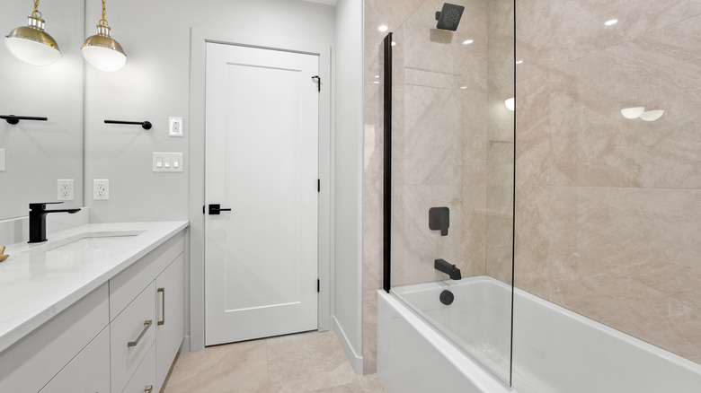 A white and beige bathroom